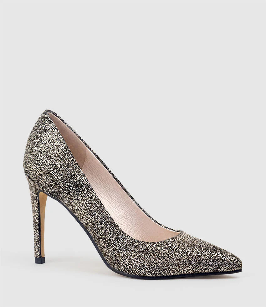 Pair of strappy heels styled with an evening dress